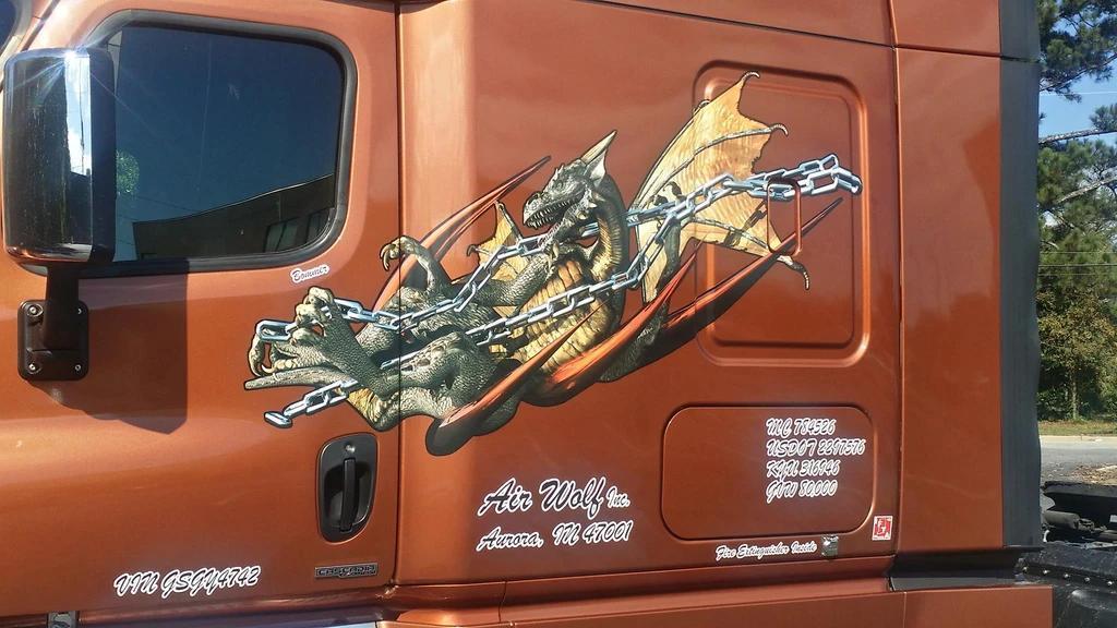 Chained dragon vinyl graphics on a big semi truck